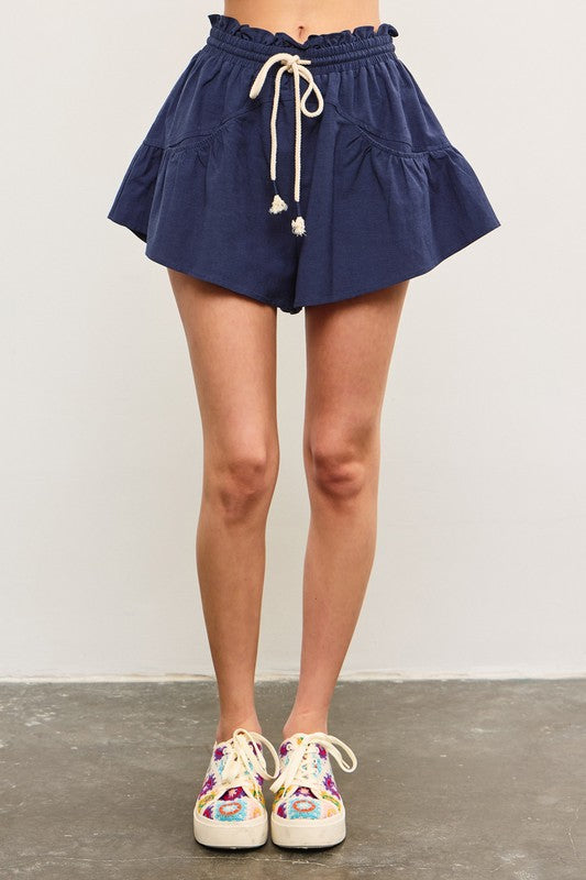 RUFFLE ELASTIC WAIST TIE FLARE SHORTS--MIDNIGHT