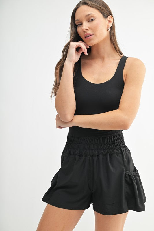 FLOUNCE & FLOW ROMPER--BLACK