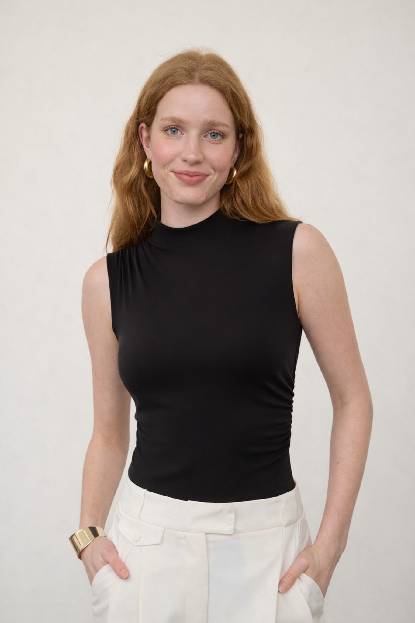 MOCK NECK SLEEVELESS BODYSUIT--BLACK