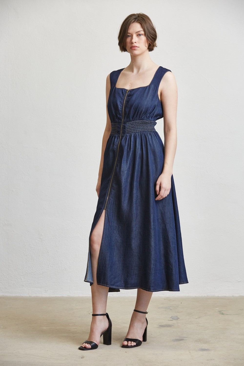 SLEEVELESS SMOCKED WAIST ZIP FRONT MIDI DRESS--DK. DENIM