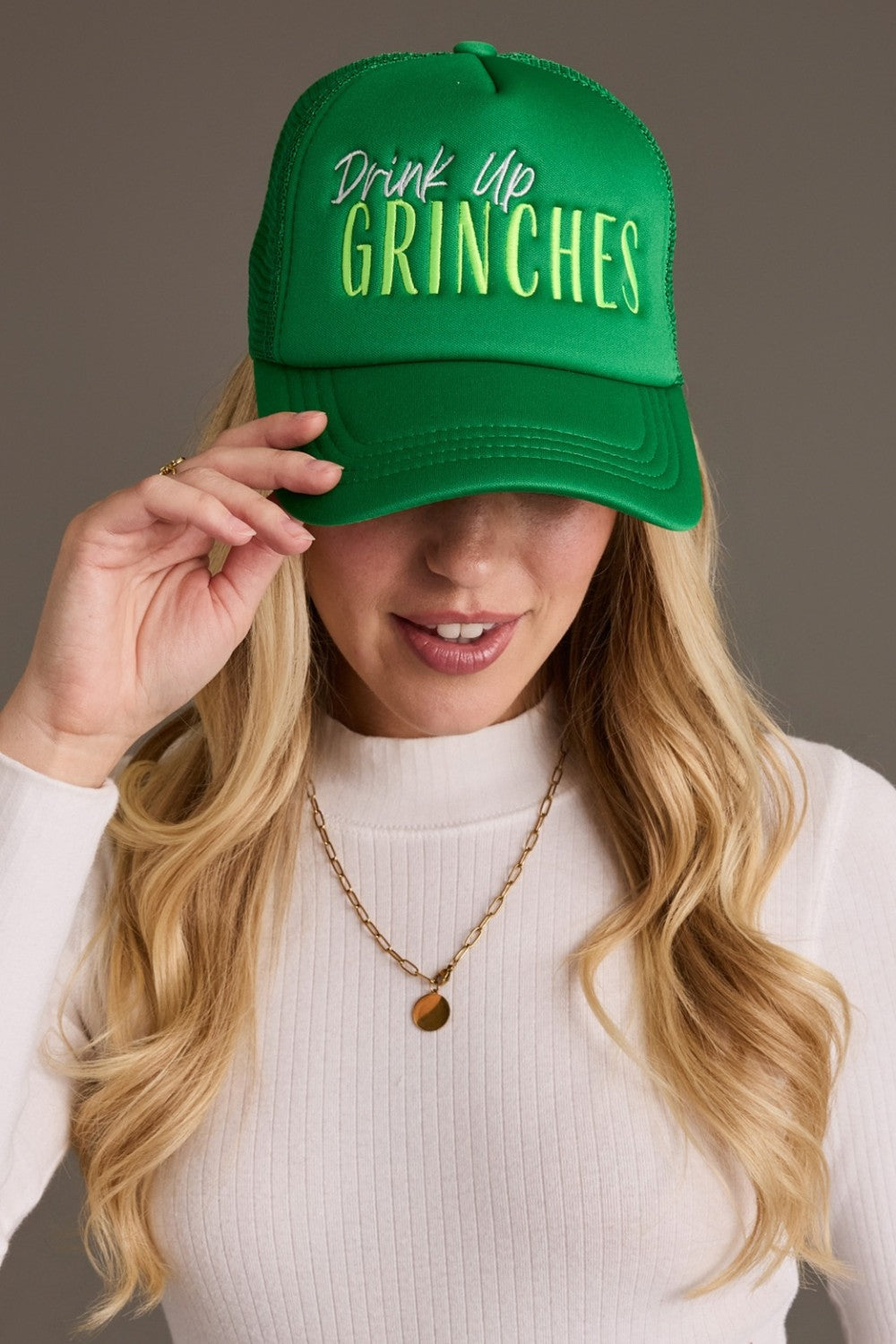 DRINK UP GRINCHES TRUCKER HAT